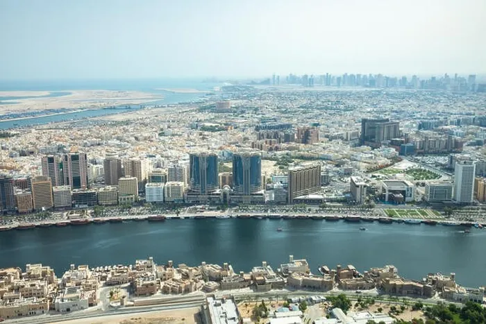 Framed Print : Cityscape view of Deira and Old Dubai area behind man-made Dubai Canal. Dubai, UAE Framed Print : Cityscape view of Deira and Old Dubai area behind man-made Dubai Canal. Dubai, UAE