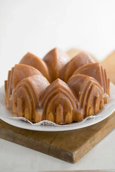 Framed Print : Classic pound cake baked in cathedral style Bundt tin, with sugar glaze - Framed Print : Classic pound cake baked in cathedral style Bundt tin, with sugar glaze -