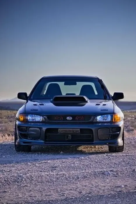 Framed Print : A Classic Subaru Impreza turbo custom car with blue sky and desert landscape Framed Print : A Classic Subaru Impreza turbo custom car with blue sky and desert landscape