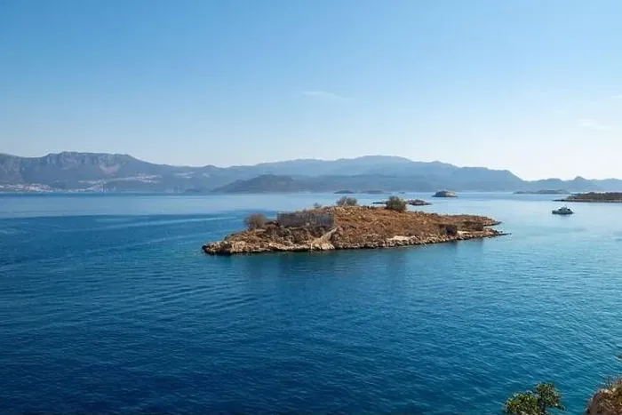 Framed Print : Clear, turquoise blue sea and small islands in the Aegean. The Greek island of Kastellorizo Framed Print : Clear, turquoise blue sea and small islands in the Aegean. The Greek island of Kastellorizo