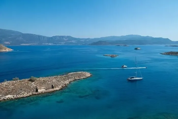 Framed Print : Clear, turquoise blue sea and small islands in the Aegean. The Greek island of Kastellorizo Framed Print : Clear, turquoise blue sea and small islands in the Aegean. The Greek island of Kastellorizo