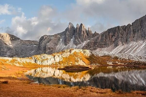 Clear turquoise water of alpine lake Piani in the Tre Cime Di Laveredo National Park, Dolomites, Italy