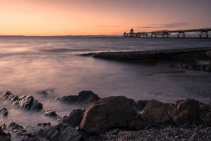 Framed Print : Clevedon Pier and beach at sunset Framed Print : Clevedon Pier and beach at sunset