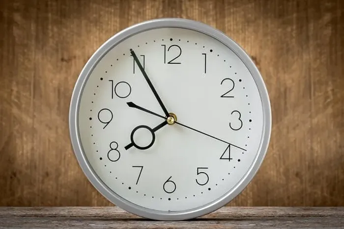 Framed Print : Clock showing 7:55 o'clock in a morning Framed Print : Clock showing 7:55 o'clock in a morning