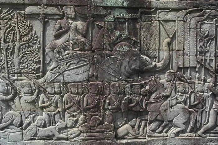 Framed Print : Close up of a frieze denoting a procession of figures with an elephant Framed Print : Close up of a frieze denoting a procession of figures with an elephant