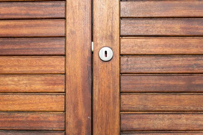 Framed Print : Close up of mahogany doors in the King George V Collonade, Bexhill-on-Sea, showing the stainless steel lock Framed Print : Close up of mahogany doors in the King George V Collonade, Bexhill-on-Sea, showing the stainless steel lock