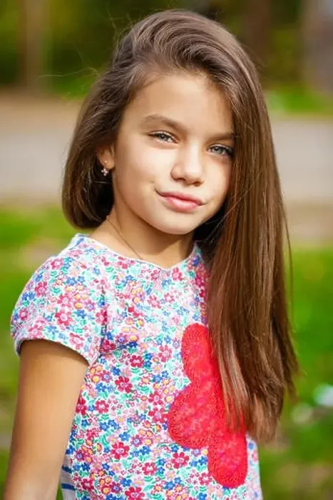 Framed Print : Close up portrait of a beautiful nine year old little girl in autumn park Framed Print : Close up portrait of a beautiful nine year old little girl in autumn park