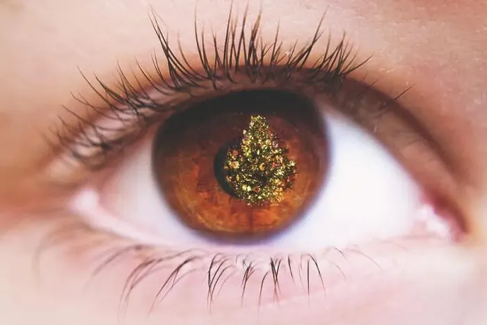 Framed Print : Close up of refection of Christmas tree in a child's eye Framed Print : Close up of refection of Christmas tree in a child's eye