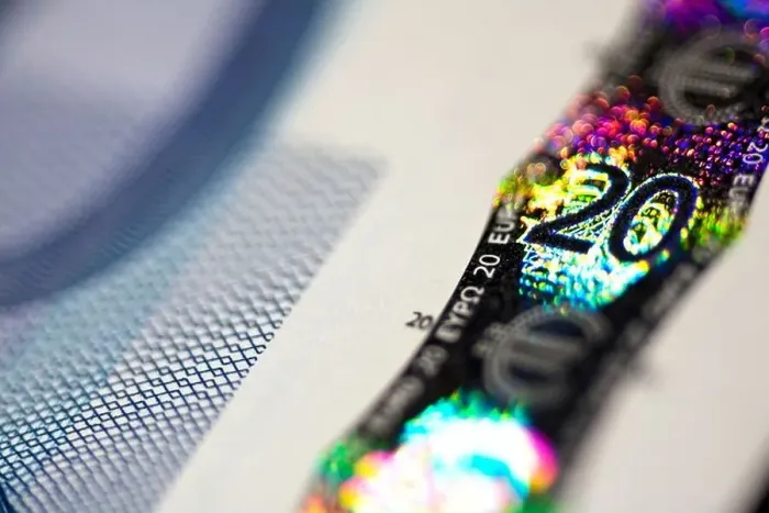 Framed Print : Close up of security hologram strip on euro bank note Framed Print : Close up of security hologram strip on euro bank note
