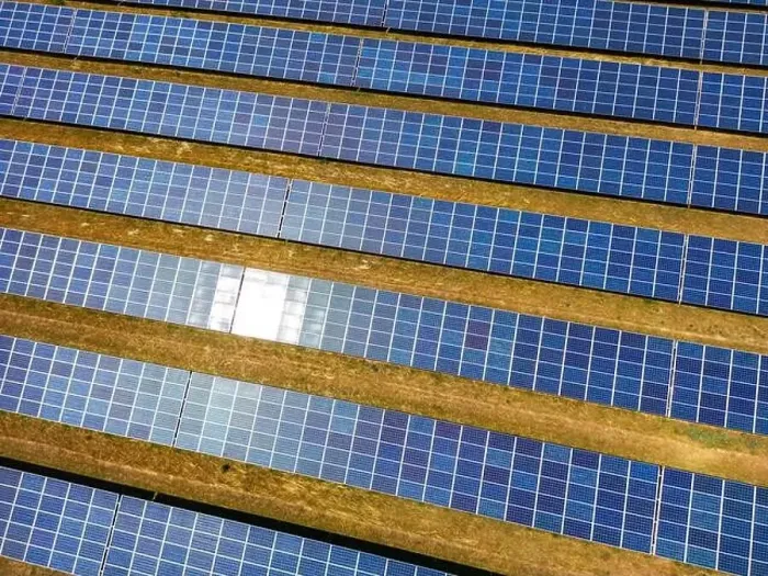 Framed Print : Close up of a solar power plant generating solar electricity over many rows of solar panels on a sunny day, Germany