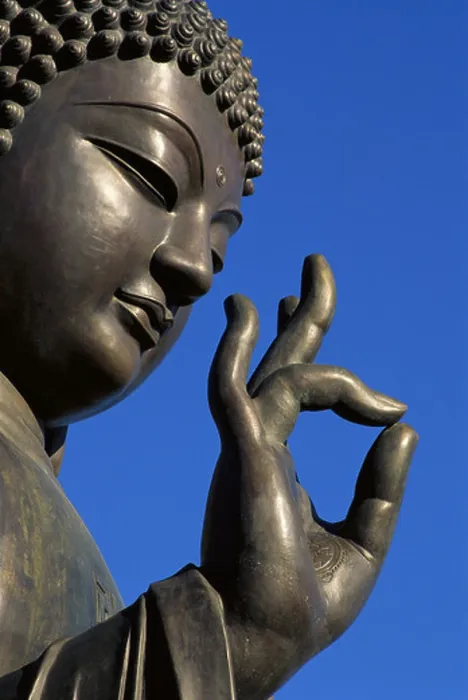 Framed Print : Close up of statue of Buddha showing hand and face Framed Print : Close up of statue of Buddha showing hand and face