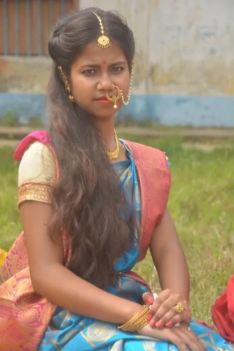Framed Print : Close up of a teenage Indian girls wearing sari Framed Print : Close up of a teenage Indian girls wearing sari