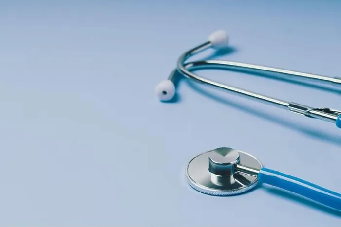 Framed Print : Close-up of Blue stethoscope of doctor for checkup on blue background Framed Print : Close-up of Blue stethoscope of doctor for checkup on blue background