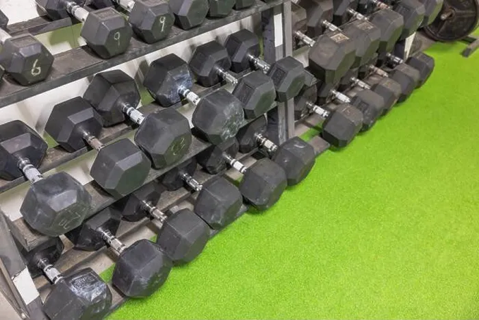 Framed Print : Close-up look at racks holding dumbbells of varying weights for comprehensive training experience. Sweden Framed Print : Close-up look at racks holding dumbbells of varying weights for comprehensive training experience. Sweden