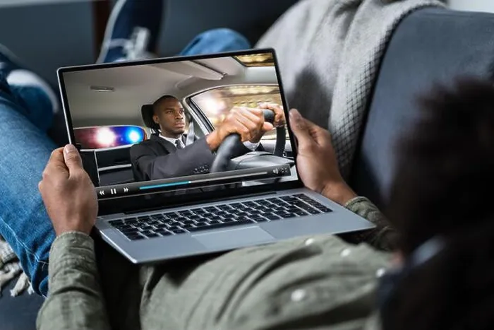 Framed Print : Close-up Of A Man Watching Thriller Movie On Laptop Framed Print : Close-up Of A Man Watching Thriller Movie On Laptop