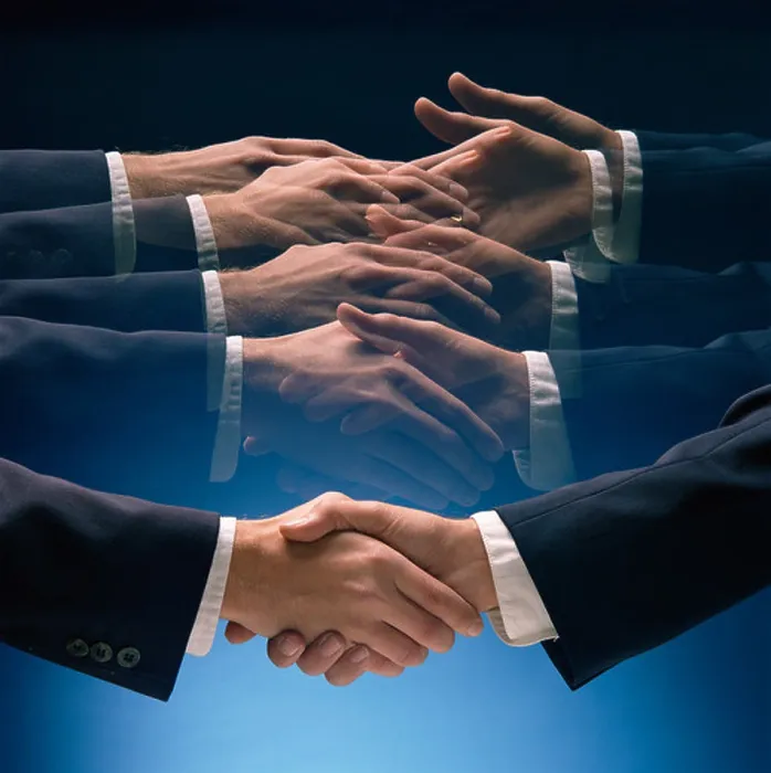 Framed Print : Close-up of two men's hands clasped in handshake