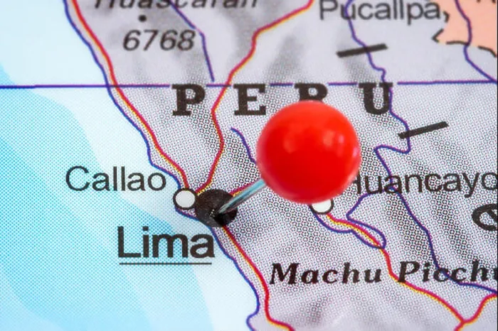 Framed Print : Close-up of a red pushpin in a map of Lima, Peru Framed Print : Close-up of a red pushpin in a map of Lima, Peru