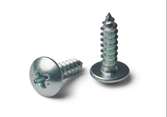Framed Print : close-up of two self tapping phillips head screws with sharp point isolated white background Framed Print : close-up of two self tapping phillips head screws with sharp point isolated white background