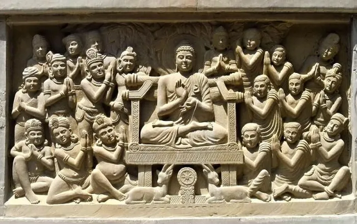 Framed Print : Close-up view of stone carving of Indian god Buddha on throne and being greeted by devotees Framed Print : Close-up view of stone carving of Indian god Buddha on throne and being greeted by devotees