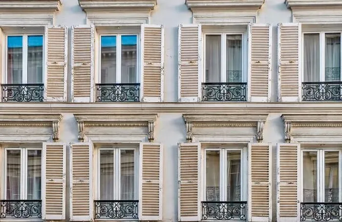 Framed Print : Close-up view of traditional French windows with open wooden shutters Framed Print : Close-up view of traditional French windows with open wooden shutters