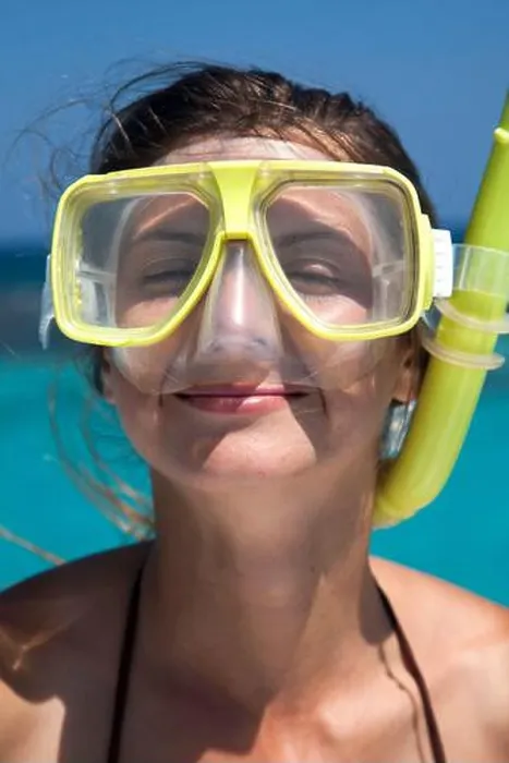 Framed Print : Close-up of a young woman wearing snorkeling gear with her eyes closed and a dreamy smile on her face at Stingray City Framed Print : Close-up of a young woman wearing snorkeling gear with her eyes closed and a dreamy smile on her face at Stingray City