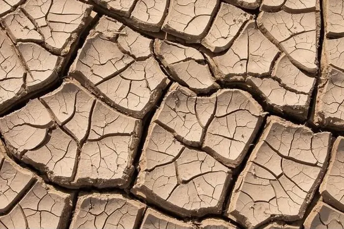 Framed Print : Closeup cracked earth with dry soil Framed Print : Closeup cracked earth with dry soil