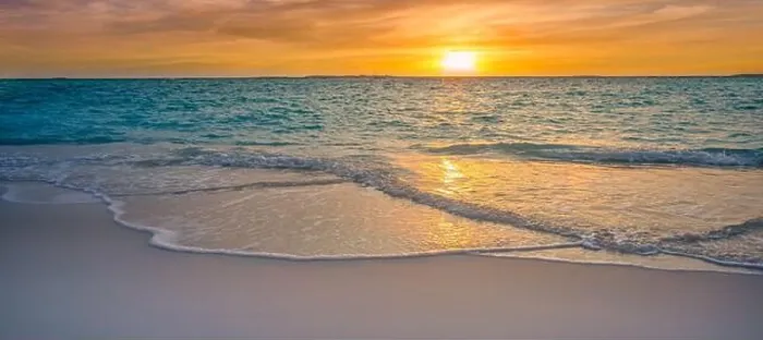 Framed Print : Closeup sea sand beach. Panoramic beach landscape. Inspire tropical seascape horizon. Colorful golden light sunset sky calmness tranquil relaxing sun Framed Print : Closeup sea sand beach. Panoramic beach landscape. Inspire tropical seascape horizon. Colorful golden light sunset sky calmness tranquil relaxing sun