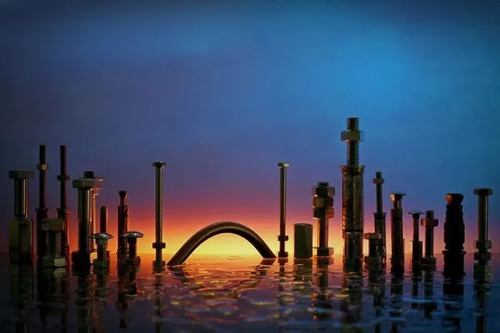 Framed Print : A closeup shot of aerospace fasteners on sunset sky background Framed Print : A closeup shot of aerospace fasteners on sunset sky background