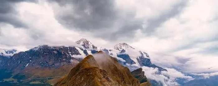 Framed Print : Clouds over Eiger, Monch and Jungfrau mountains view from Mannlichen Framed Print : Clouds over Eiger, Monch and Jungfrau mountains view from Mannlichen