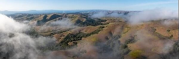Clouds sweep over the serene, scenic hills of the East Bay, just east of San Francisco Bay, Northern California