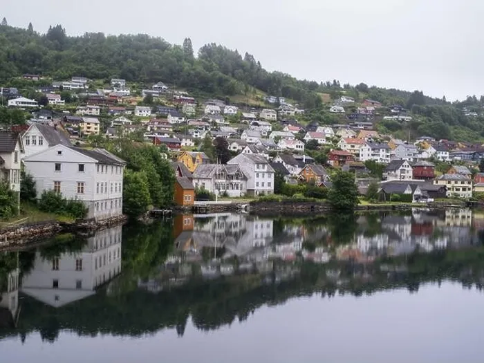 Framed Print : Cloudy summer view of Hardangerfjord and Norheimsund village, Norway, Europe Framed Print : Cloudy summer view of Hardangerfjord and Norheimsund village, Norway, Europe