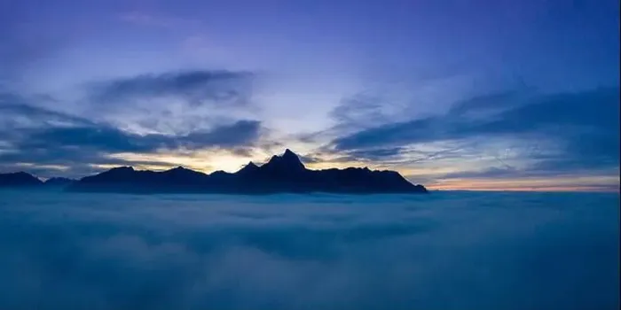 Framed Print : cloudy sunset panorama over clouds with view to mountain chain hahenkamm at reutte