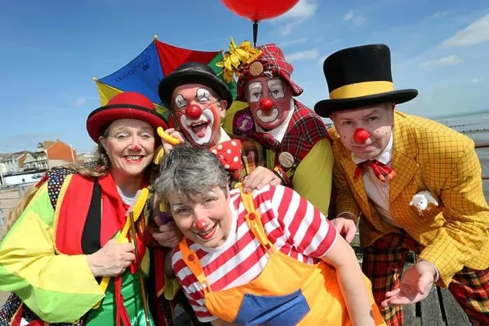 Framed Print : Clowns performing in the Bognor Regis Clowns Festival 2017 pictured on Bognor Regis Pier in the sun to promote Framed Print : Clowns performing in the Bognor Regis Clowns Festival 2017 pictured on Bognor Regis Pier in the sun to promote