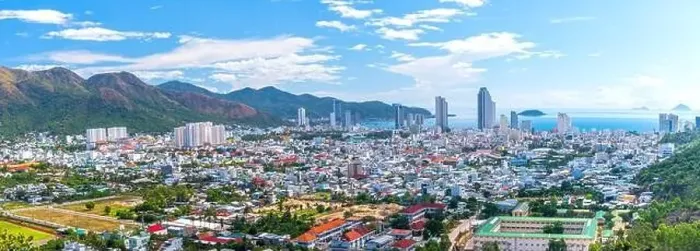 Framed Print : The coastal city of Nha Trang seen from above on a sunny summer afternoon Framed Print : The coastal city of Nha Trang seen from above on a sunny summer afternoon