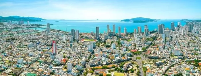 Framed Print : The coastal city of Nha Trang seen from above on a sunny summer afternoon Framed Print : The coastal city of Nha Trang seen from above on a sunny summer afternoon