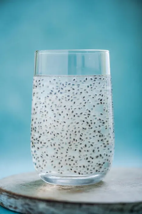 Framed Print : coconut water with basil seeds in glass on bright background Framed Print : coconut water with basil seeds in glass on bright background
