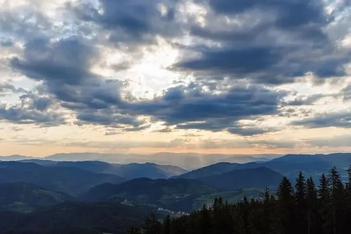 Framed Print : Cold cloudy rainy weather over low hills covered with spruce evergreen forests in Rhodope Mountains against backdrop of Framed Print : Cold cloudy rainy weather over low hills covered with spruce evergreen forests in Rhodope Mountains against backdrop of