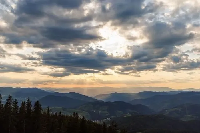 Framed Print : Cold cloudy rainy weather over low hills covered with spruce evergreen forests in Rhodope Mountains against backdrop of Framed Print : Cold cloudy rainy weather over low hills covered with spruce evergreen forests in Rhodope Mountains against backdrop of