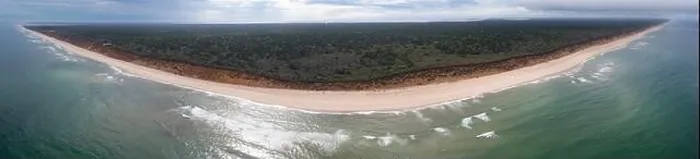 Framed Print : The cold, nutrient-filled water of the Atlantic Ocean washes onto a scenic and empty beach in Eastham, Cape Cod, Massachusetts Framed Print : The cold, nutrient-filled water of the Atlantic Ocean washes onto a scenic and empty beach in Eastham, Cape Cod, Massachusetts
