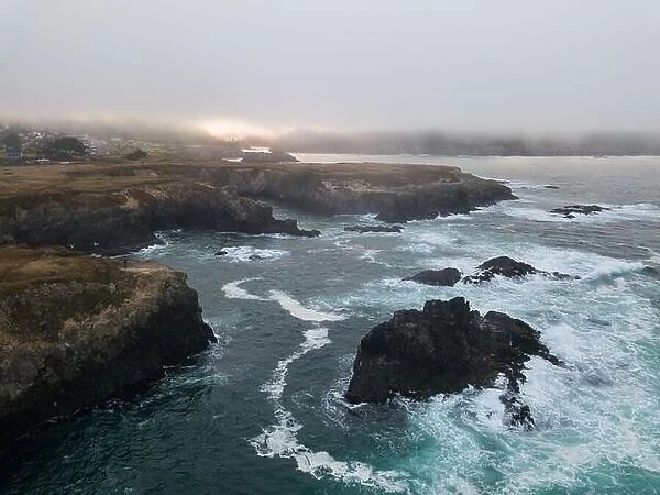 The cold water of the Pacific Ocean washes onto the coast of Mendocino in Northern California. This coastal part of the U.S. is incredibly beautiful