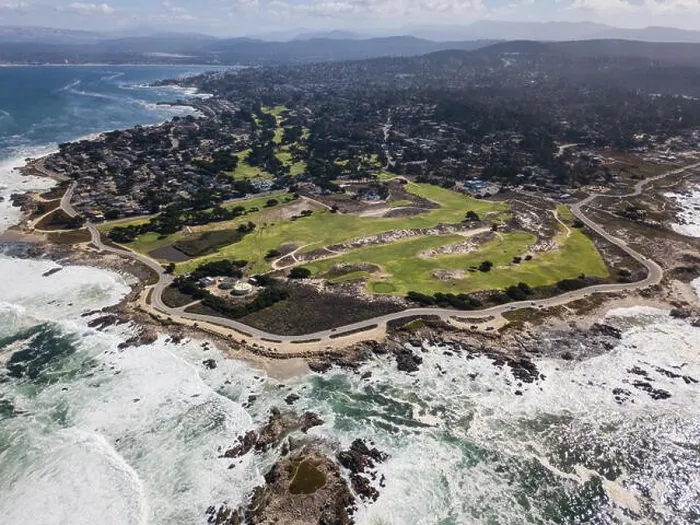 Framed Print : The cold waters of the Pacific Ocean wash against the rocky Northern California coastline in Monterey, just south of San Francisco