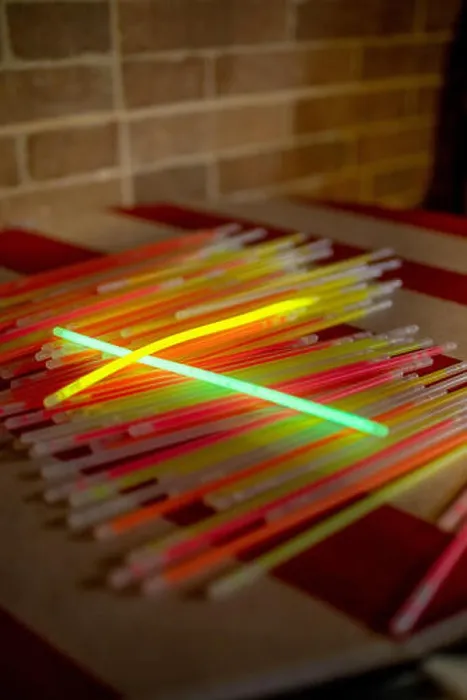 Framed Print : Collection of glowsticks on a night party Framed Print : Collection of glowsticks on a night party
