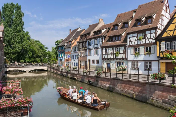 Framed Print : Colmar, Alsace wine region, France, Europe - Tourists boating on the river in Petite Venise or Little Venice district Framed Print : Colmar, Alsace wine region, France, Europe - Tourists boating on the river in Petite Venise or Little Venice district