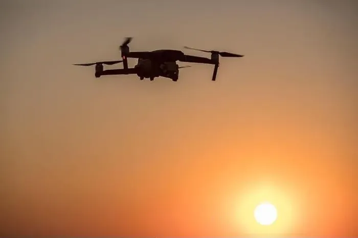 Framed Print : Color image of a drone flying at sunrise Framed Print : Color image of a drone flying at sunrise
