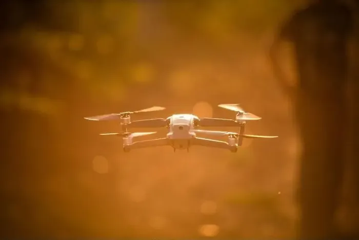 Framed Print : Color image of a drone flying at sunrise Framed Print : Color image of a drone flying at sunrise