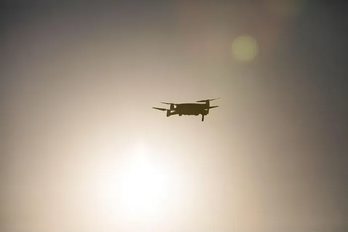 Framed Print : Color image of a drone flying at sunrise Framed Print : Color image of a drone flying at sunrise