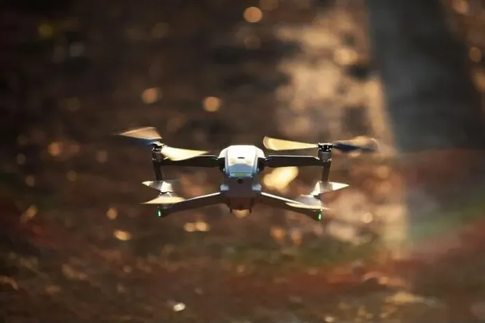Framed Print : Color image of a drone flying at sunrise Framed Print : Color image of a drone flying at sunrise