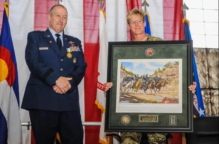 Framed Print : Colorado Army National Guard Brig. Gen. Laura Clellan, Land Component Commander, presents United States Air Force Maj. Gen. H Framed Print : Colorado Army National Guard Brig. Gen. Laura Clellan, Land Component Commander, presents United States Air Force Maj. Gen. H