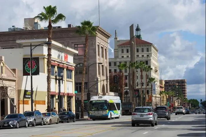 Framed Print : Colorado Boulevard looking east in the City of Pasadena shown against a sky with storm clouds Framed Print : Colorado Boulevard looking east in the City of Pasadena shown against a sky with storm clouds