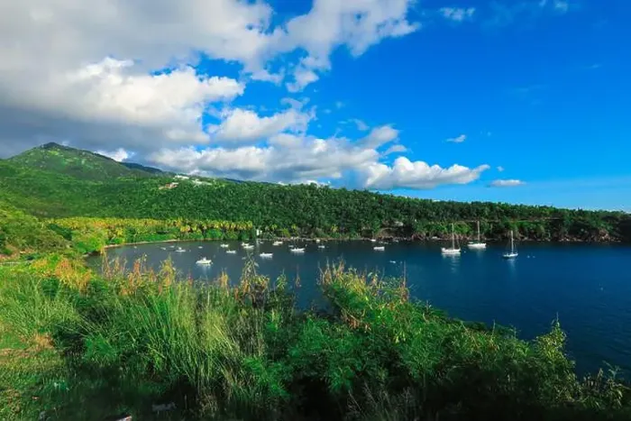 Framed Print : Colorful Bay with the Small Boats among the Green Mountains, Guadeloupe island Framed Print : Colorful Bay with the Small Boats among the Green Mountains, Guadeloupe island